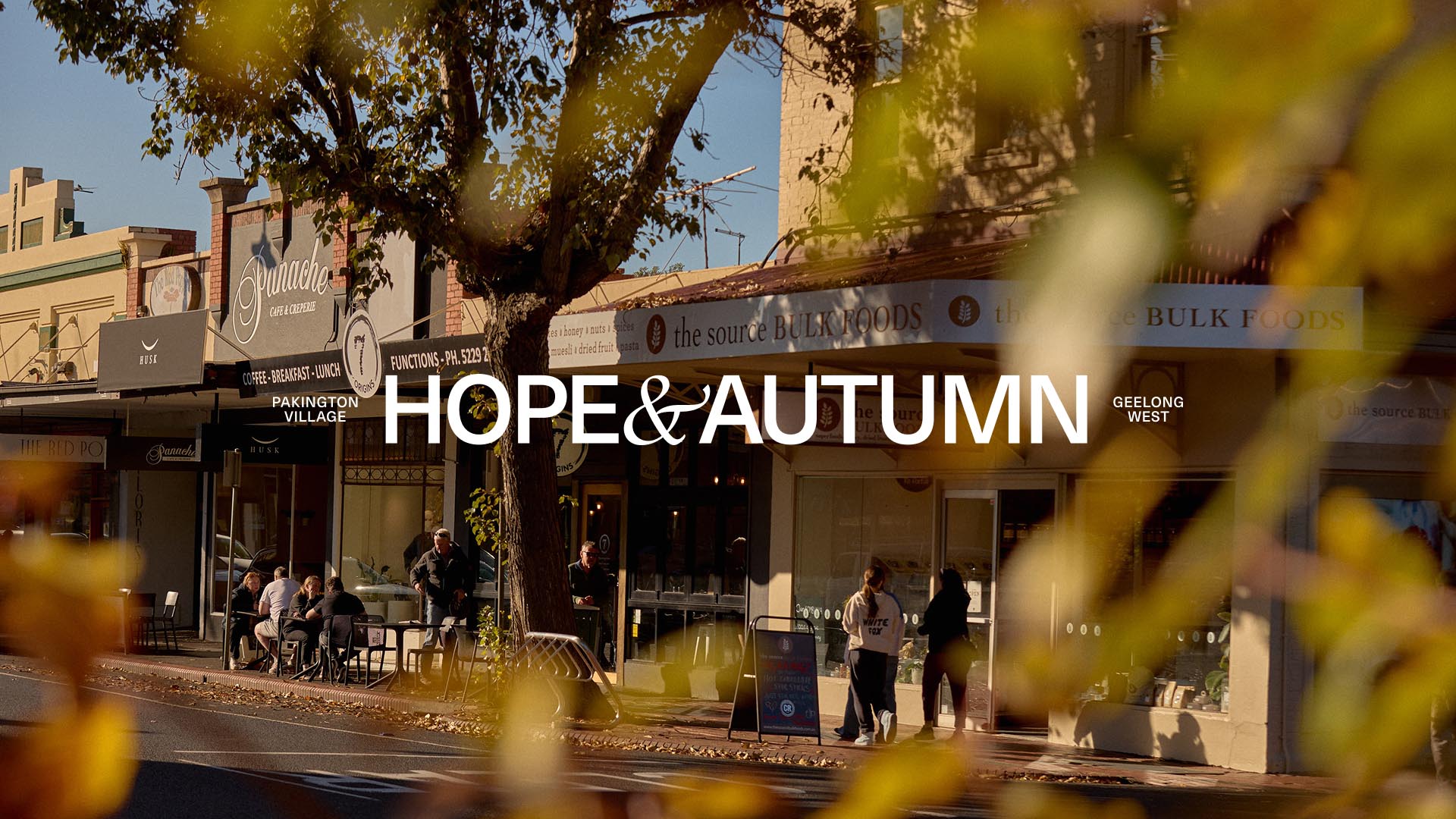 city, restaurant, street, urban, neighborhood, cafe, cafeteria, person, chair, shopping mall